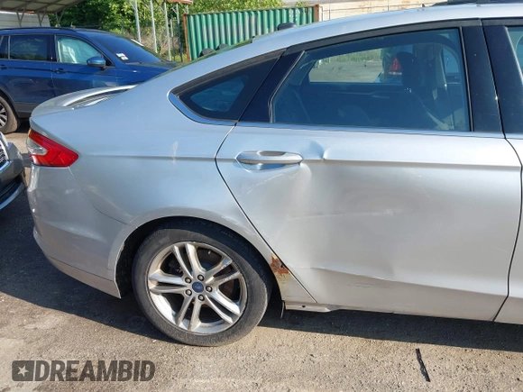 2016 Ford Fusion SE Hybrid z VIN 3FA6P0LU6GR121605, wystawiony jako IAAI lot #42651096 z przebiegiem 194 693 mil mil oraz . Historia ofert i sprzedaży dostępna na DreamBid. Obrazek 12.