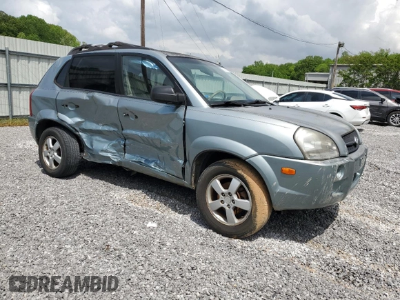 2005 Hyundai Tucson GL with VIN KM8JM12B05U148660, listed as a Copart auction lot 54302805 with 257,233 mi miles and Salvage title. Bid and sale history available at DreamBid. Image 4.