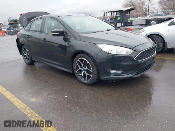 2015 Ford Focus SE with VIN 1FADP3F22FL240476, listed as a IAAI auction lot 41739722 with 159,179 mi miles. Bid and sale history available at carsss.com. Image 1.