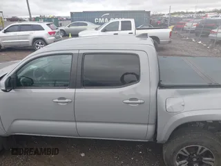2019 Toyota Tacoma SR z VIN 3TMCZ5AN1KM206969, wystawiony jako IAAI lot #41951159 z przebiegiem 94 875 mil mil oraz . Historia ofert i sprzedaży dostępna na DreamBid. Obrazek 14.