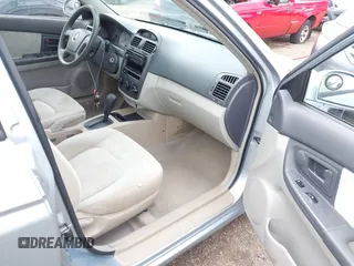 2004 Kia Spectra LX z VIN KNAFE121345017467, wystawiony jako IAAI lot #41911311 z przebiegiem 221 086 mil mil oraz . Historia ofert i sprzedaży dostępna na DreamBid. Obrazek 5.