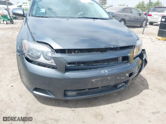 2006 Scion tC with VIN JTKDE177260081483, listed as a IAAI auction lot 42076072 with 156,556 mi miles. Bid and sale history available at carsss.com. Image 19.