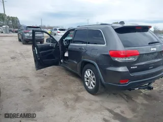 2014 Jeep Grand Cherokee Laredo with VIN 1C4RJEAG1EC573704, listed as a IAAI auction lot 41864355 with 141,970 mi miles. Bid and sale history available at carsss.com. Image 3.