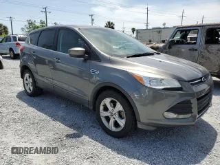 2014 Ford Escape SE with VIN 1FMCU0GXXEUB83262, listed as a Copart auction lot 53948235 with 113,548 mi miles and Clean Title. Bid and sale history available at DreamBid. Image 4.