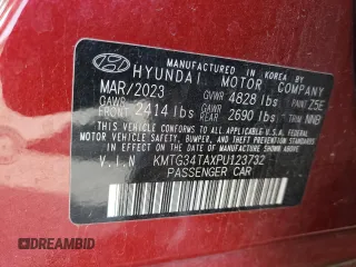 2023 Genesis G70 2.0T with VIN KMTG34TAXPU123732, listed as a Copart auction lot 56509935 with 39,333 mi miles and Salvage title. Bid and sale history available at DreamBid. Image 12.