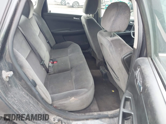 2014 Chevrolet Impala LS with VIN 2G1WA5E30E1125611, listed as a IAAI auction lot 41828292 with 141,826 mi miles and . Bid and sale history available at DreamBid. Image 8.