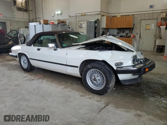 1989 Jaguar XJS z VIN SAJNV4847KC151989, wystawiony jako Copart lot #61401054 z przebiegiem 80 570 mil mil oraz Szkody całkowita. Historia ofert i sprzedaży dostępna na DreamBid. Obrazek 4.
