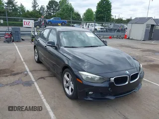 2012 BMW 3 Series 328i with VIN WBA3A5G51CNP17522, listed as a IAAI auction lot 42124868 with 154,385 mi miles and . Bid and sale history available at carsss.com. Image 1.