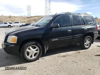 2005 GMC Envoy SLE with VIN 1GKDT13S952201133, listed as a Copart auction lot 48504025 with 200,240 mi miles and Salvage Title. Bid and sale history available at carsss.com. Image 1.