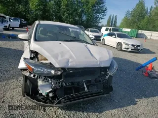 2015 Ford Focus Titanium z VIN 1FADP3N24FL262321, wystawiony jako Copart lot #59635525 z przebiegiem Nie podano mil oraz Szkoda całkowita • Salvage title. Historia ofert i sprzedaży dostępna na DreamBid. Obrazek 15.