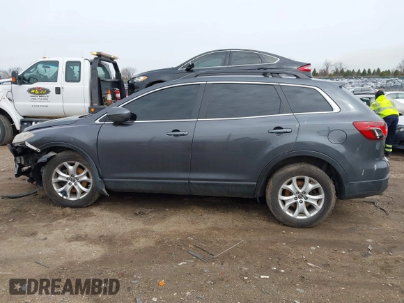 2015 Mazda CX-9 Touring with VIN JM3TB2CA0F0463313, listed as a IAAI auction lot 41822436 with 145,302 mi miles. Bid and sale history available at carsss.com. Image 14.