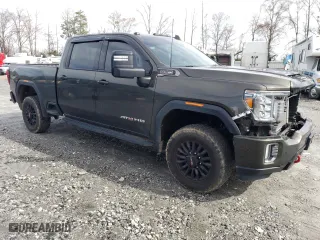 2023 GMC Sierra 2500HD AT4 with VIN 1GT49PE70PF187396, listed as a Copart auction lot 43544445 with 27,432 mi miles and Salvage Title. Bid and sale history available at carsss.com. Image 4.