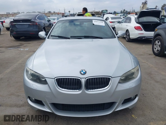 2010 BMW 3 Series 335i with VIN WBAWL7C53AP474127, listed as a IAAI auction lot 41871518 with 111,136 mi miles. Bid and sale history available at carsss.com. Image 12.