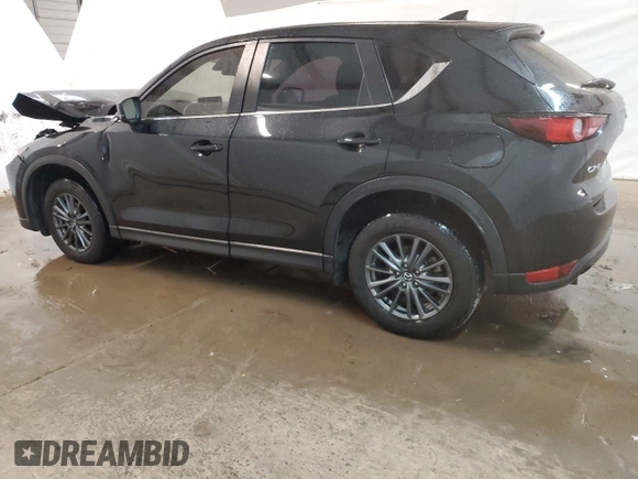 2021 Mazda CX-5 Sport with VIN JM3KFABM4M0334722, listed as a Copart auction lot 44021125 with 64,590 mi miles and Clean Title. Bid and sale history available at carsss.com. Image 2.