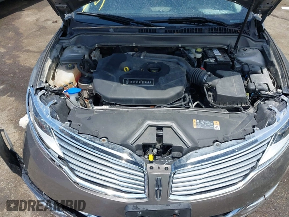 2016 Lincoln MKZ z VIN 3LN6L2J97GR617086, wystawiony jako IAAI lot #42446924 z przebiegiem 107 591 mil mil oraz . Historia ofert i sprzedaży dostępna na DreamBid. Obrazek 10.