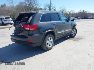 2011 Jeep Grand Cherokee Laredo z VIN 1J4RR4GG9BC519132, wystawiony jako IAAI lot #41931266 z przebiegiem 118 534 mil mil oraz . Historia ofert i sprzedaży dostępna na DreamBid. Obrazek 4.