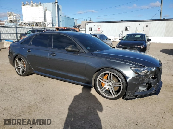 2015 Audi A6 Prestige z VIN WAUHGAFC2FN006252, wystawiony jako Copart lot #80515204 z przebiegiem 131 466 mil mil oraz Szkoda całkowita • Salvage title. Historia ofert i sprzedaży dostępna na DreamBid. Obrazek 4.