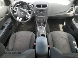 2014 Dodge Avenger SXT z VIN 1C3CDZCG6EN131544, wystawiony jako Copart lot #53955425 z przebiegiem 118 977 mil mil oraz Szkoda całkowita • Salvage title. Historia ofert i sprzedaży dostępna na DreamBid. Obrazek 8.