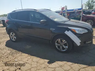2014 Ford Escape SE with VIN 1FMCU9GX1EUD71589, listed as a Copart auction lot 63191785 with 112,579 mi miles and Clean title. Bid and sale history available at DreamBid. Image 4.