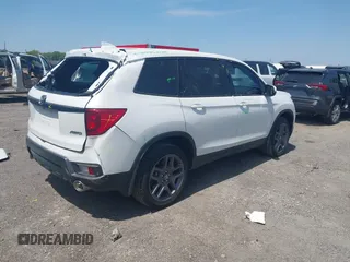 2023 Honda Passport EX-L z VIN 5FNYF8H57PB006499, wystawiony jako IAAI lot #42036371 z przebiegiem 51 404 mil mil oraz . Historia ofert i sprzedaży dostępna na DreamBid. Obrazek 4.