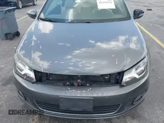 2014 Volkswagen Eos Sport with VIN WVWBW8AH2EV000313, listed as a IAAI auction lot 42333112 with 106,125 mi miles and . Bid and sale history available at DreamBid. Image 19.