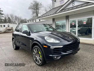 2016 Porsche Cayenne S E-Hybrid z VIN WP1AE2A23GLA62291, wystawiony jako Copart lot #55436825 z przebiegiem 117 448 mil mil oraz Czysty tytuł • Clean title. Historia ofert i sprzedaży dostępna na DreamBid. Obrazek 1.