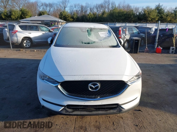 2017 Mazda CX-5 Touring with VIN JM3KFBCL8H0136601, listed as a IAAI auction lot 41830355 with 113,677 mi miles. Bid and sale history available at carsss.com. Image 13.