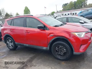 2016 Toyota RAV4 LE z VIN JTMZFREV6GJ078639, wystawiony jako IAAI lot #41891971 z przebiegiem 154 929 mil mil oraz . Historia ofert i sprzedaży dostępna na DreamBid. Obrazek 13.