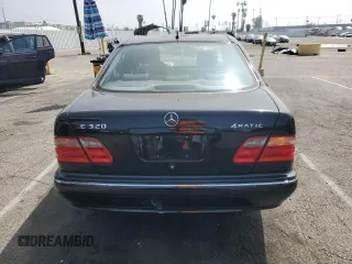2002 Mercedes-Benz E-Class with VIN WDBJF82JX2X064384, listed as a Copart auction lot 53058325 with 188,440 mi miles and Salvage Title. Bid and sale history available at carsss.com. Image 6.