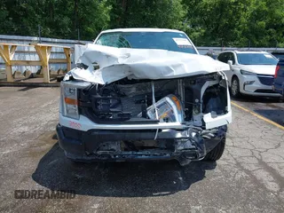 2022 Ford F-150 XL z VIN 1FTEW1EB9NKD69780, wystawiony jako IAAI lot #42572005 z przebiegiem Nie podano mil oraz . Historia ofert i sprzedaży dostępna na DreamBid. Obrazek 11.
