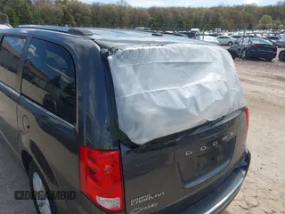 2018 Dodge Grand Caravan SXT z VIN 2C4RDGCG8JR129835, wystawiony jako IAAI lot #42190326 z przebiegiem 81 818 mil mil oraz . Historia ofert i sprzedaży dostępna na DreamBid. Obrazek 19.