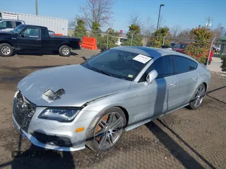 2014 Audi S7 Prestige with VIN WAUW2AFC6EN140766, listed as a IAAI auction lot 41780769 with 101,318 mi miles. Bid and sale history available at carsss.com. Image 2.