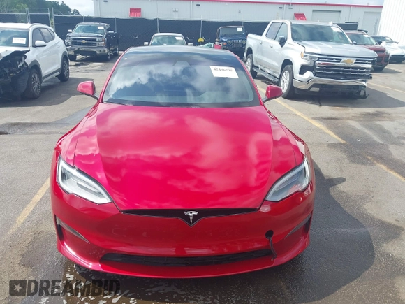 2021 Tesla Model S Plaid z VIN 5YJSA1E69MF439987, wystawiony jako IAAI lot #42496725 z przebiegiem 25 mil mil oraz . Historia ofert i sprzedaży dostępna na DreamBid. Obrazek 12.