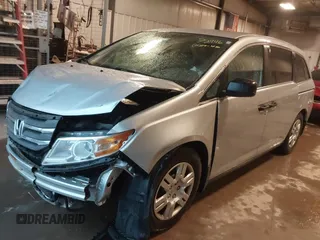 2012 Honda Odyssey LX with VIN 5FNRL5H27CB092988, listed as a IAAI auction lot 41933507 with 123,233 mi miles and . Bid and sale history available at DreamBid. Image 20.