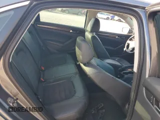 2013 Volkswagen Passat SEL Premium z VIN 1VWCN7A36DC135095, wystawiony jako Copart lot #57338905 z przebiegiem 151 843 mil mil oraz Szkoda całkowita • Salvage title. Historia ofert i sprzedaży dostępna na DreamBid. Obrazek 10.