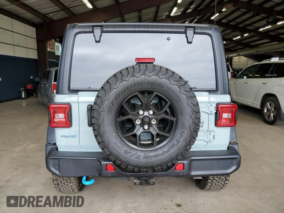 2024 Jeep Wrangler Sport S with VIN 1C4RJXN66RW167175, listed as a Copart auction lot 62923525 with 14,103 mi miles and Clean title. Bid and sale history available at DreamBid. Image 6.