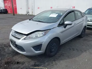 2011 Ford Fiesta SE with VIN 3FADP4BJ8BM216789, listed as a IAAI auction lot 41843080 with 95,424 mi miles. Bid and sale history available at carsss.com. Image 2.