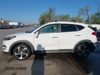 2016 Hyundai Tucson Limited with VIN KM8J33A29GU051038, listed as a IAAI auction lot 41995825 with 97,775 mi miles. Bid and sale history available at carsss.com. Image 14.