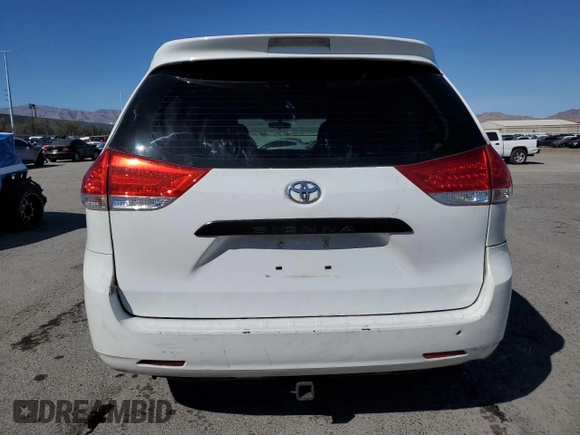 2012 Toyota Sienna with VIN 5TDZK3DC2CS244967, listed as a Copart auction lot 49787795 with 242,667 mi miles and Salvage Title. Bid and sale history available at carsss.com. Image 6.