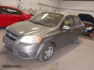 2011 Chevrolet Aveo LT w/1LT with VIN KL1TD5DE5BB198819, listed as a IAAI auction lot 41992498 with 156,145 mi miles. Bid and sale history available at carsss.com. Image 2.