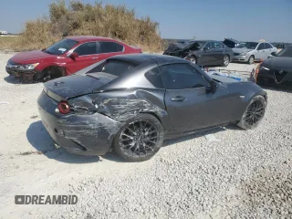 2023 Mazda MX-5 Miata Grand Touring z VIN JM1NDAM70P0550719, wystawiony jako Copart lot #75485484 z przebiegiem 21 110 mil mil oraz Szkoda całkowita • Salvage title. Historia ofert i sprzedaży dostępna na DreamBid. Obrazek 3.