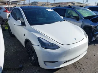 2025 Tesla Model Y Performance with VIN 7SAYGDEF7SF215188, listed as a IAAI auction lot 41461956 with 9,458 mi miles. Bid and sale history available at carsss.com. Image 1.