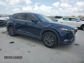 2020 Mazda CX-9 Touring with VIN JM3TCACY1L0423340, listed as a Copart auction lot 57389305 with 64,737 mi miles and Salvage title. Bid and sale history available at DreamBid. Image 4.