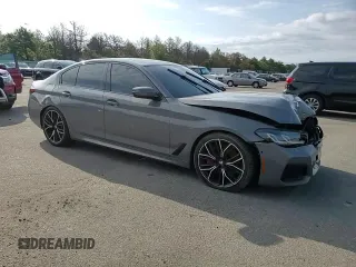 2022 BMW 5 Series M550i xDrive z VIN WBA13BK00NCJ03264, wystawiony jako Copart lot #68976084 z przebiegiem 39 515 mil mil oraz Szkoda całkowita • Salvage title. Historia ofert i sprzedaży dostępna na DreamBid. Obrazek 10.