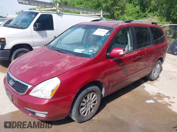 2014 Kia Sedona LX with VIN KNDMG4C71E6564595, listed as a IAAI auction lot 42015687 with 208,270 mi miles. Bid and sale history available at carsss.com. Image 2.