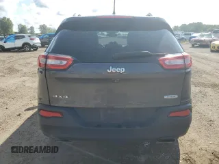 2015 Jeep Cherokee North with VIN 1C4PJMCSXFW582677, listed as a Copart auction lot 67999984 with 220,045 mi miles and Salvage Title. Bid and sale history available at carsss.com. Image 6.