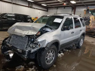 2002 Ford Escape XLT Choice with VIN 1FMYU041X2KD64911, listed as a IAAI auction lot 41590864 with 109,968 mi miles. Bid and sale history available at carsss.com. Image 17.