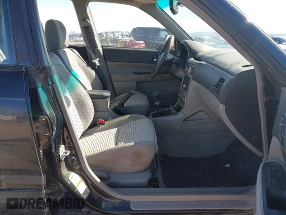 2003 Subaru Forester XS with VIN JF1SG65673G743292, listed as a IAAI auction lot 41587235 with 251,523 mi miles. Bid and sale history available at carsss.com. Image 5.
