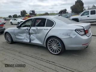 2013 BMW 7 Series 750i with VIN WBAYA8C57DC996498, listed as a Copart auction lot 52907415 with 109,405 mi miles and Salvage Title. Bid and sale history available at DreamBid. Image 2.