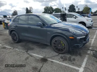 2017 Porsche Cayenne S E-Hybrid with VIN WP1AE2A26HLA74128, listed as a Copart auction lot 46486355 with 57,482 mi miles and Salvage title. Bid and sale history available at DreamBid. Image 4.